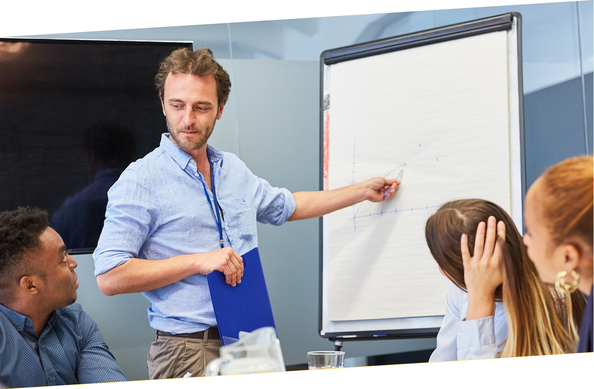 man presenting in a classroom